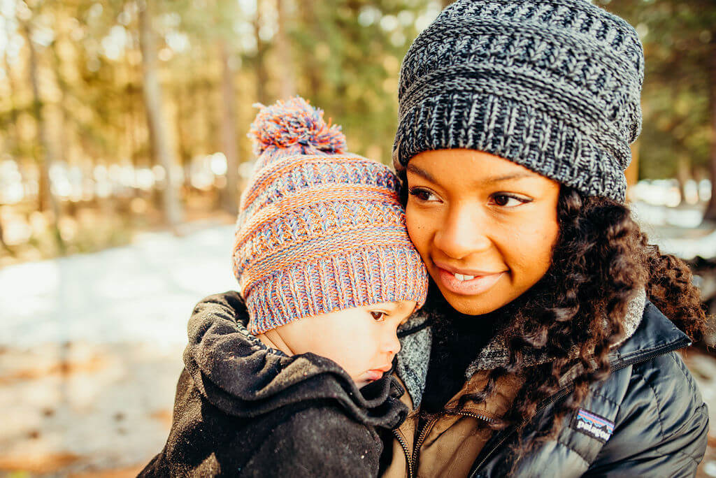 Mother and daughter wearing Satin Lined Winter hats to keep warm in Washington State